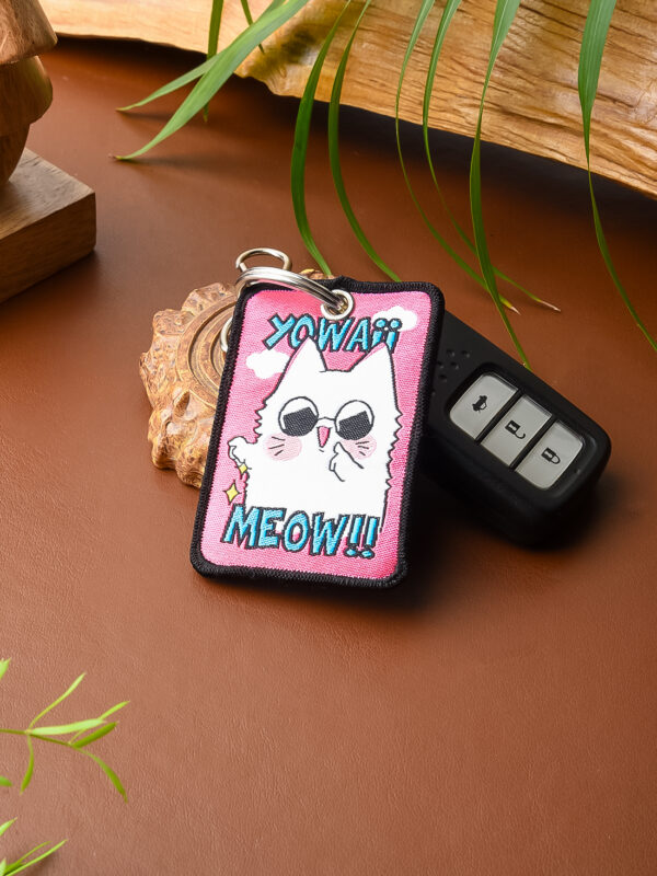 jjk_strongestnekosorcerer_lanyard_listing2_hitanshi.jpg Strongest Neko Sorcerer Woven Keychain