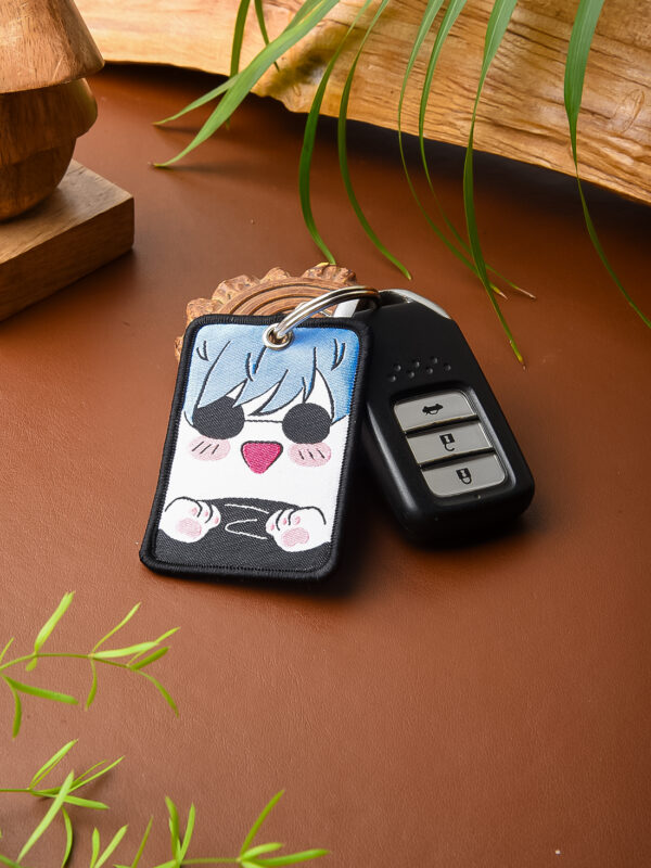 jjk_strongestnekosorcerer_lanyard_listing3_hitanshi.jpg Strongest Neko Sorcerer Woven Keychain