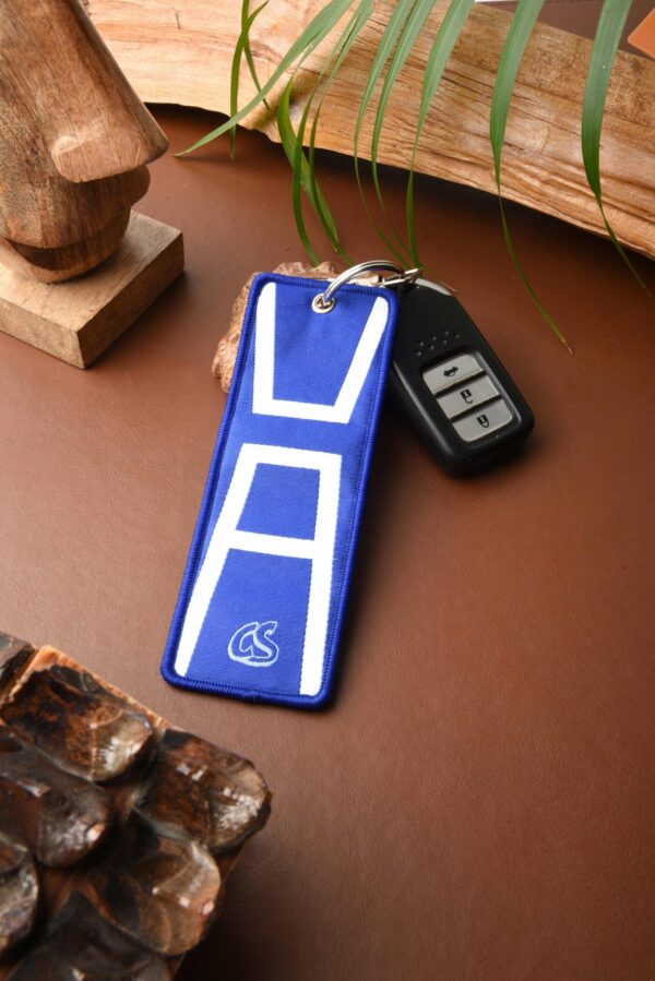 Beyond Plus Ultra Woven Keychain