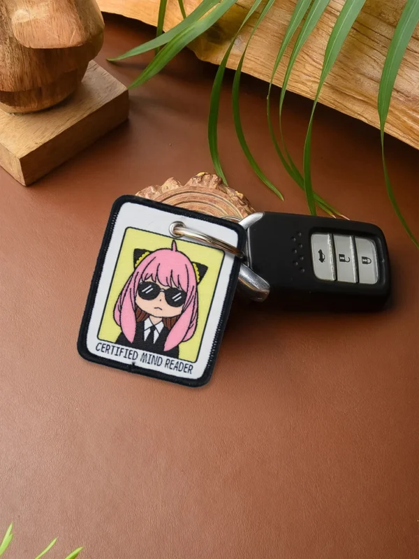 Secret-telepath-Keychain-3_comicsense.webp Secret Telepath Woven Keychain