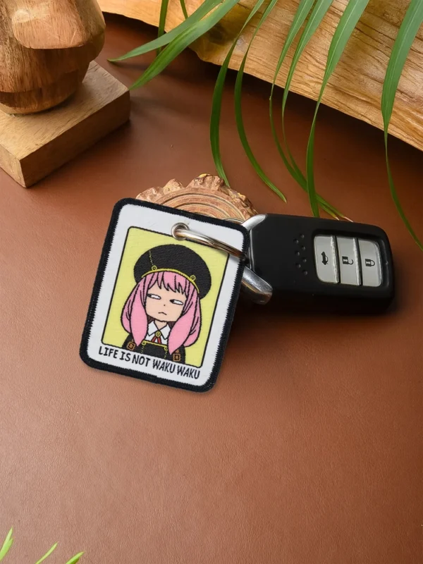 Secret-telepath-Keychain-4_comicsense.webp Secret Telepath Woven Keychain